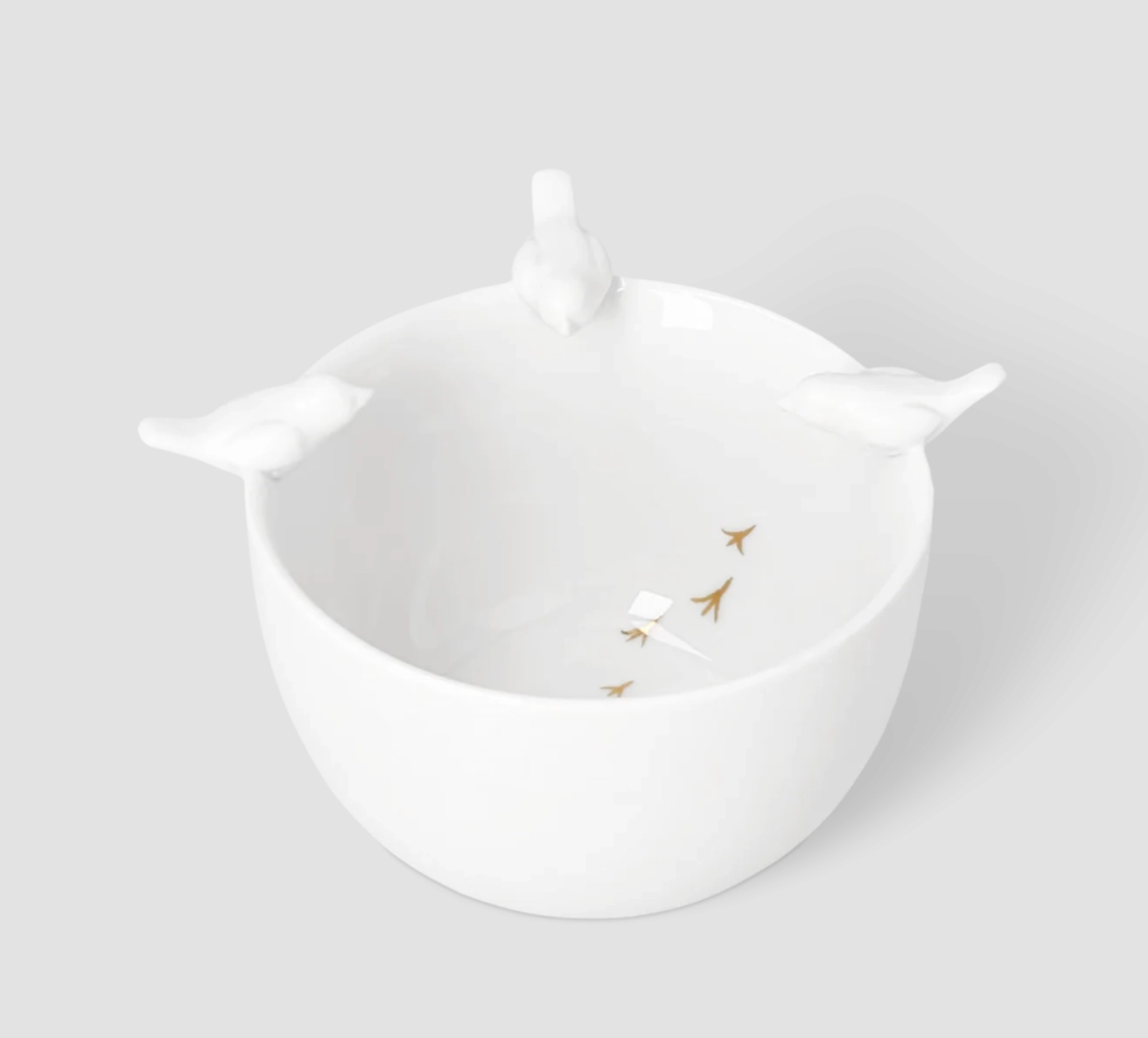räder kom met vogels goud
